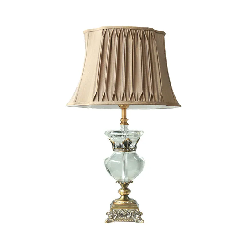 Minimalist Gold Bell Night Lamp with Clear K9 Crystal Shade and Stylish Urn-Shaped Base